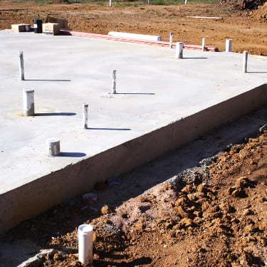 Création terrasse en béton par maçon